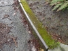 Steel railing on concrete curb